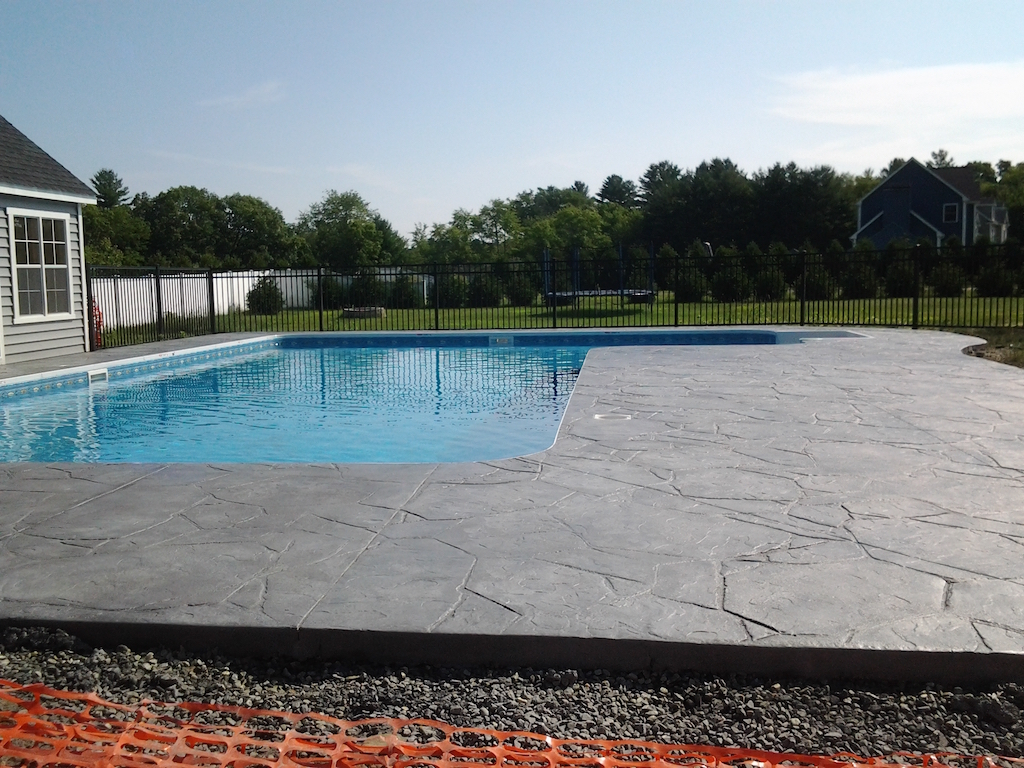 Swimming pool and stamped concrete project example 150